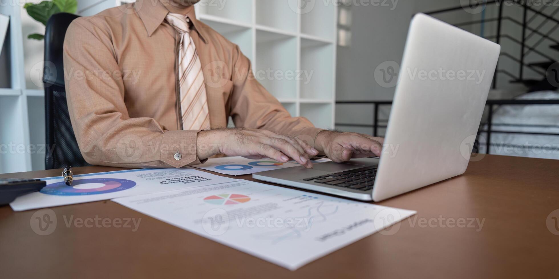 Business professional analyzing data reports office environment digital content modern workspace strategic insights photo