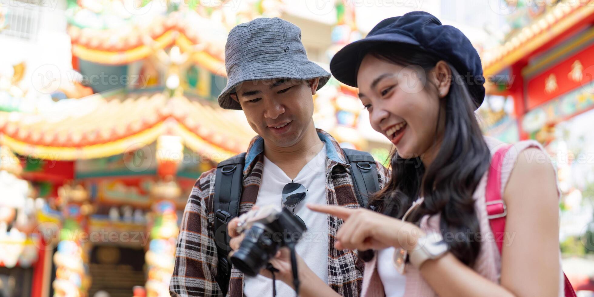 Travel adventures together a couple capturing memories at a colorful cultural festival photo