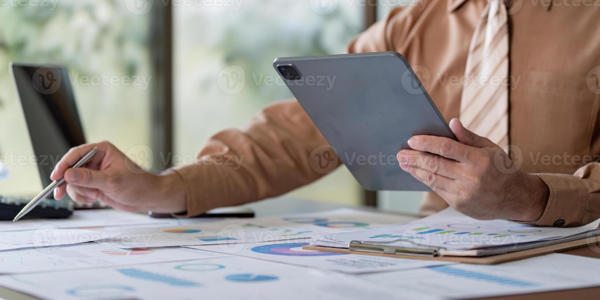 Business professional engaged in data analysis modern office digital workspace calm environment close up perspective photo