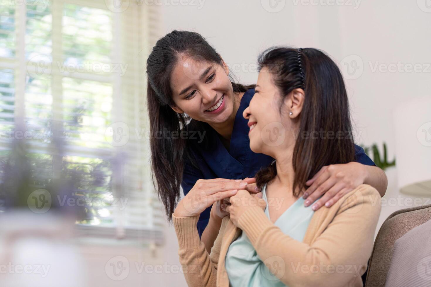 Supportive caregiver assisting patient at home indoor setting emotional support warm environment close up perspective photo