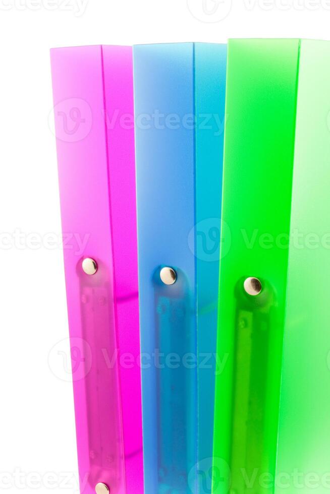 three multicolored folders photo