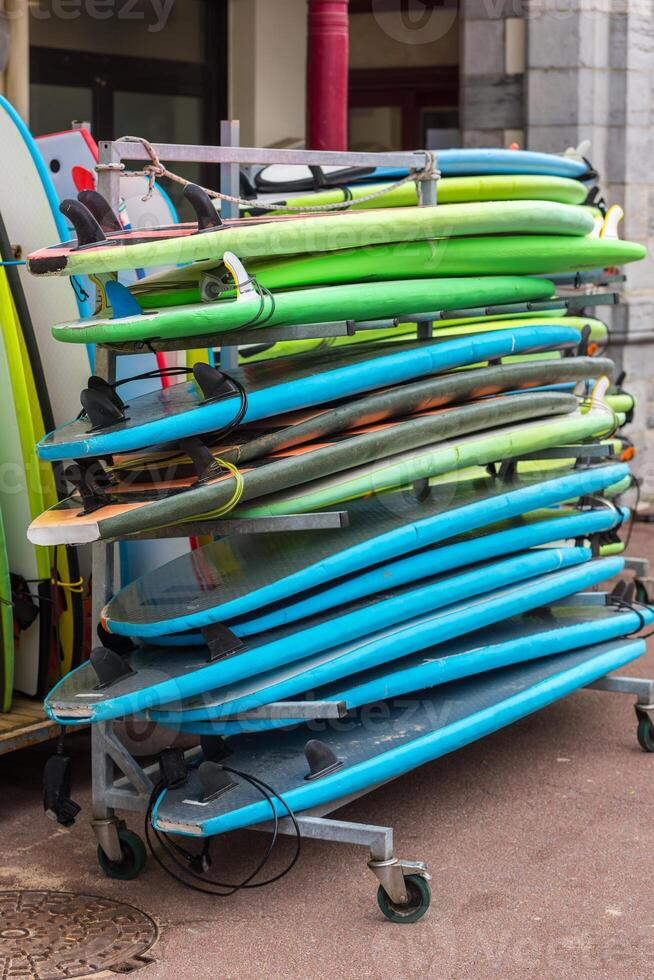 Surf boards in a stack photo