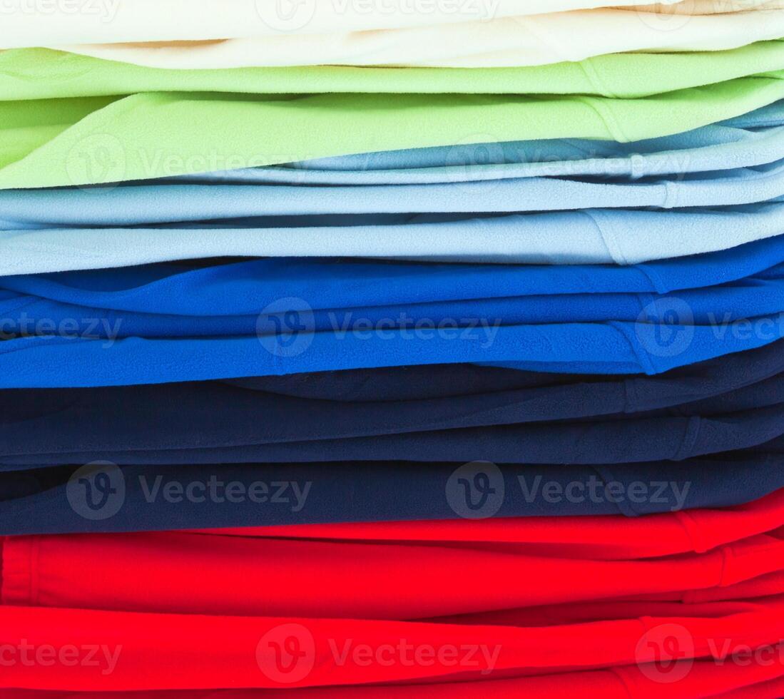 multicolor sport shirts in store photo