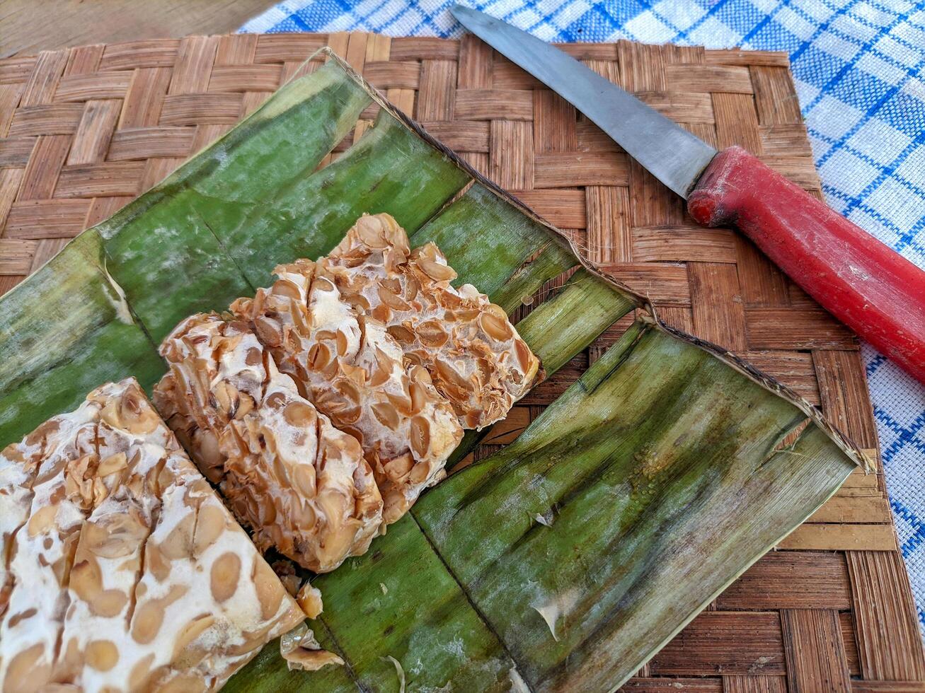 Tempe or tempeh is a typical Indonesian food made from fermented soybeans in addition to yeast or tempeh yeast. photo