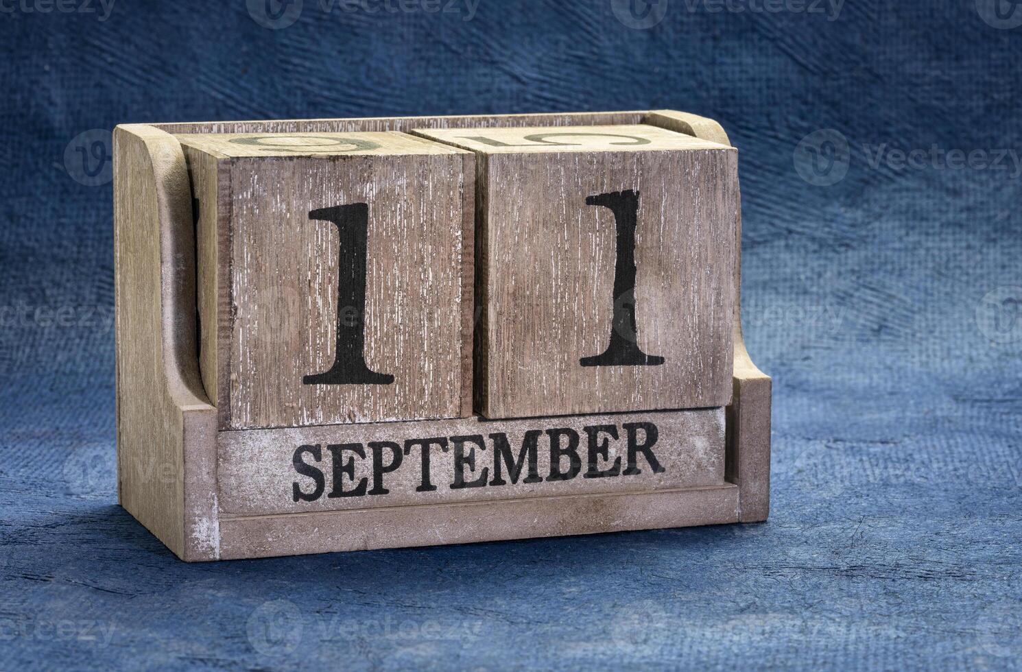 September 11 date in a rustic wood block calendar photo