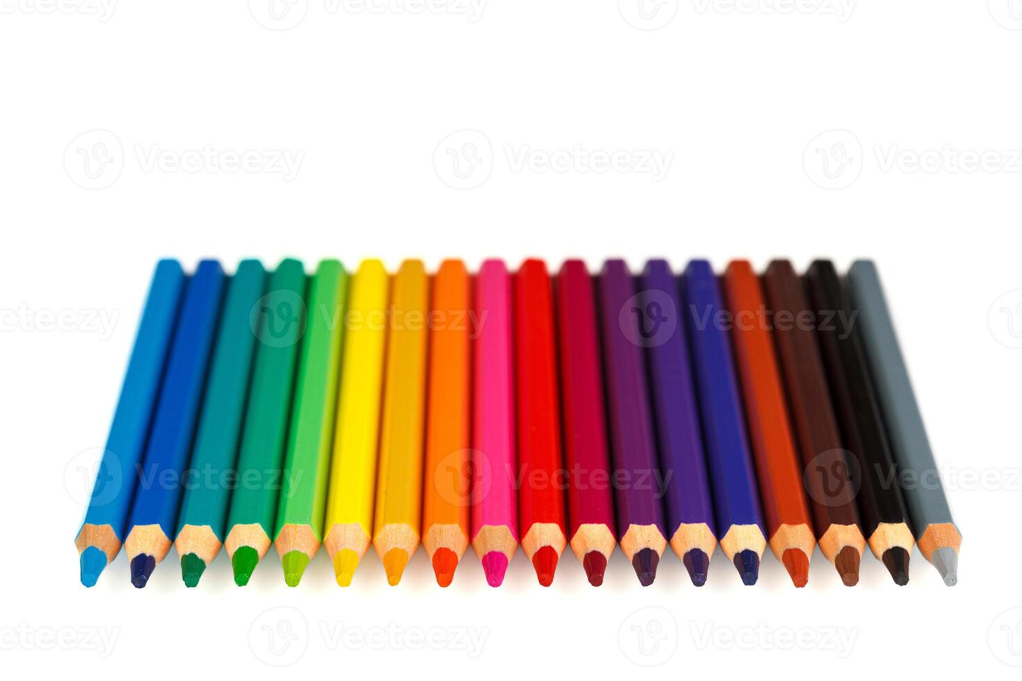 set of multi-colored pencils on a white background photo