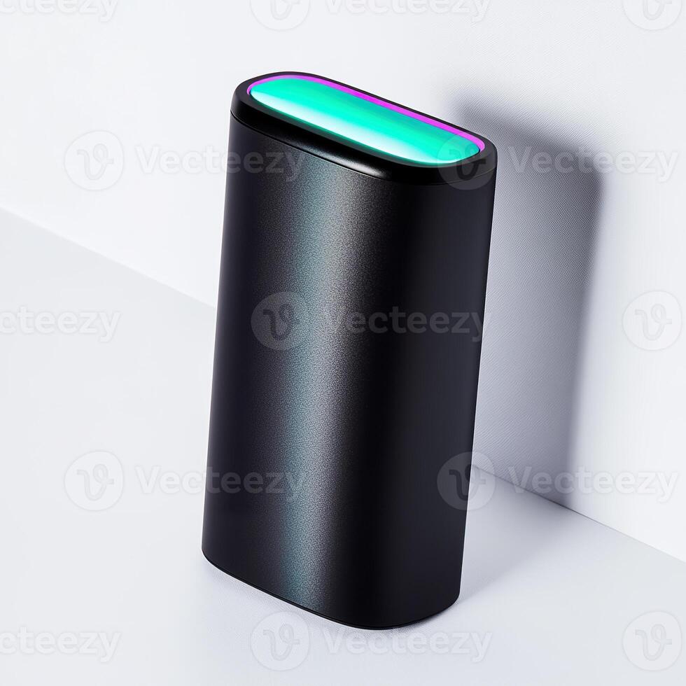Modern black tech device with glowing light on white background. photo
