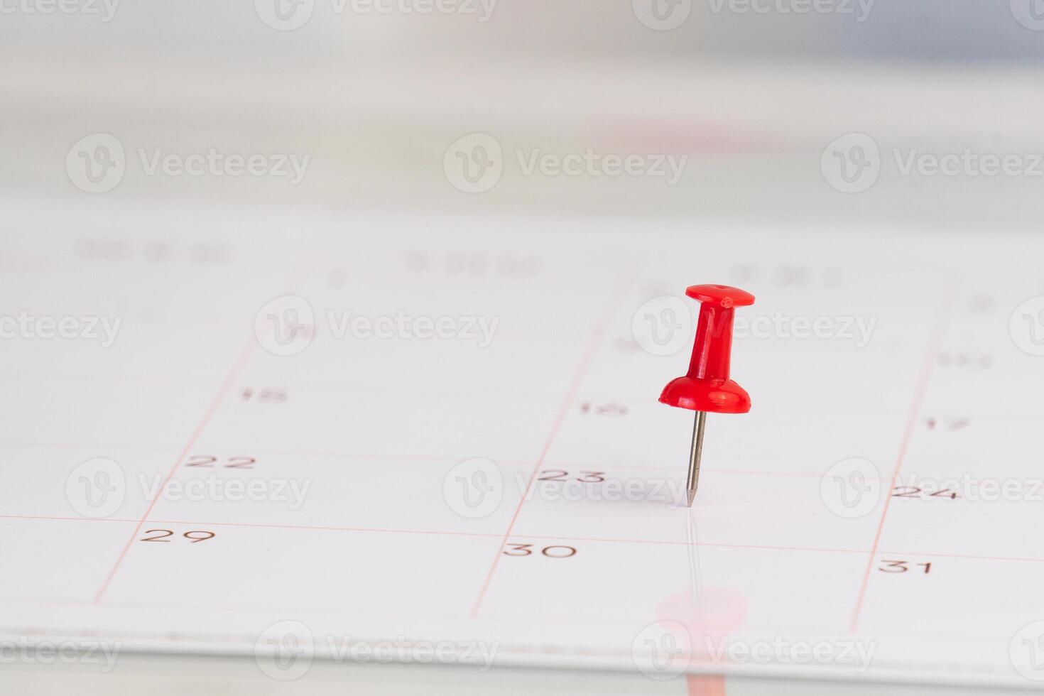 Important dates on a calendar with a red Pin photo