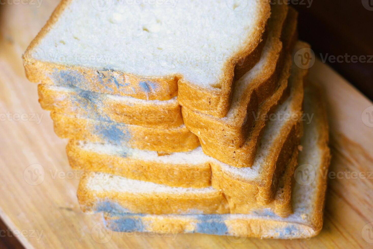 Loaf of bread with mold photo