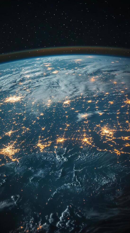 View of Earth from space showcasing city lights and cloud formations at night photo