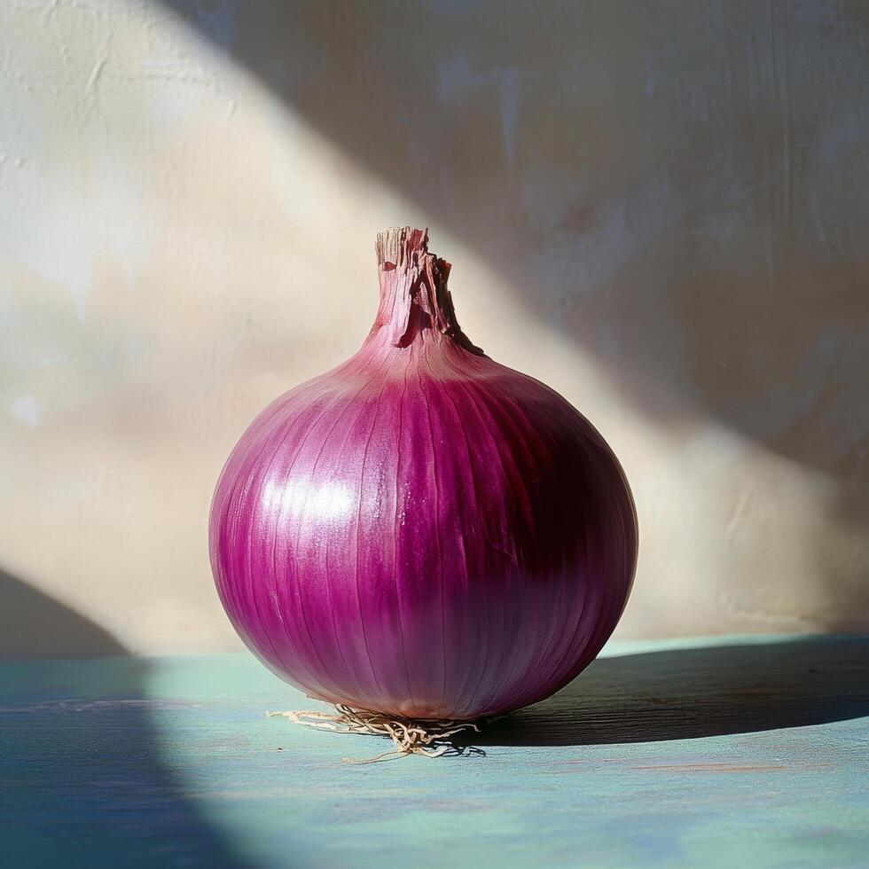 Purple onion resting on a surface with soft natural light highlighting its texture and color photo