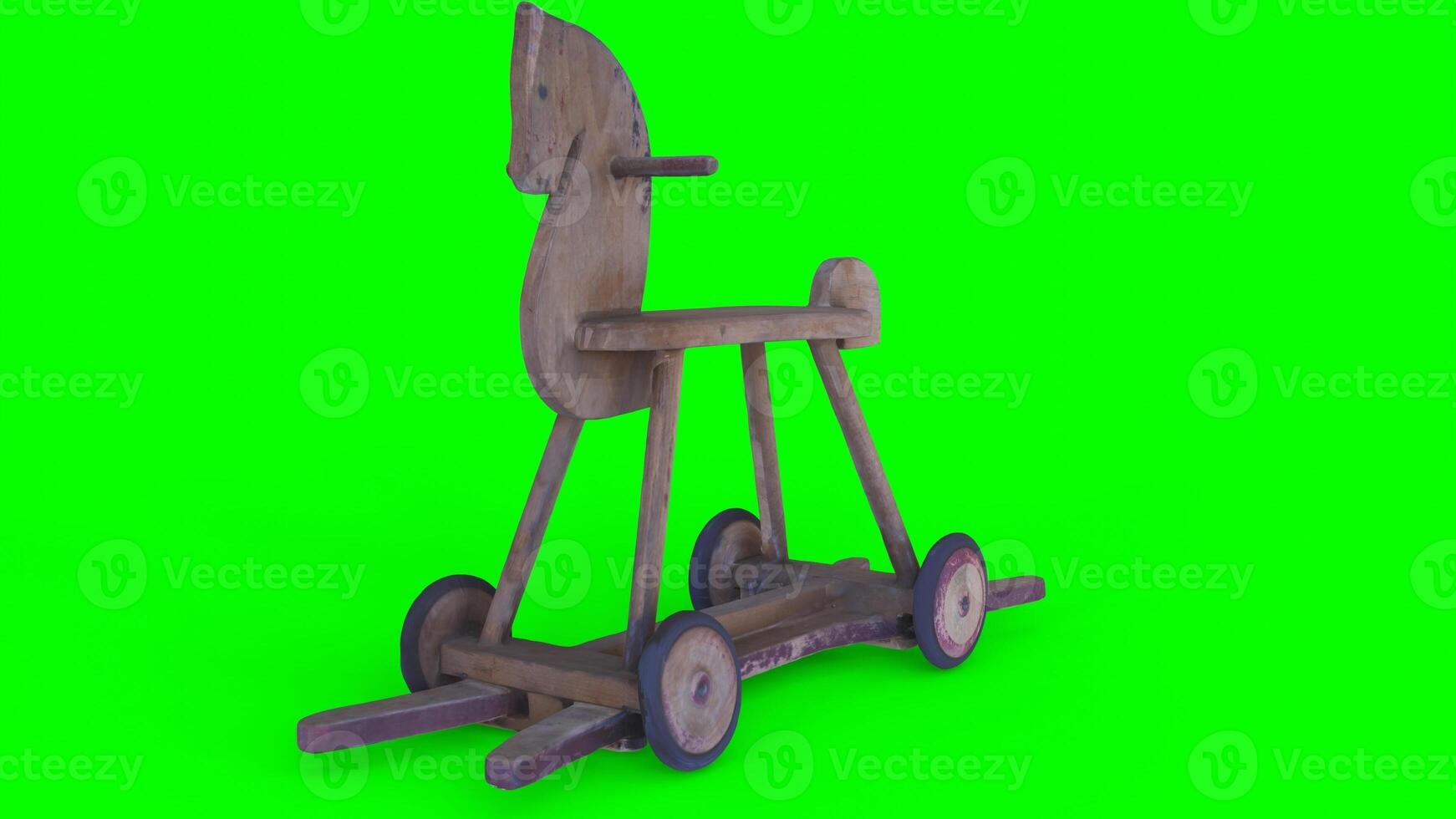 wooden horse with wheels with green background photo