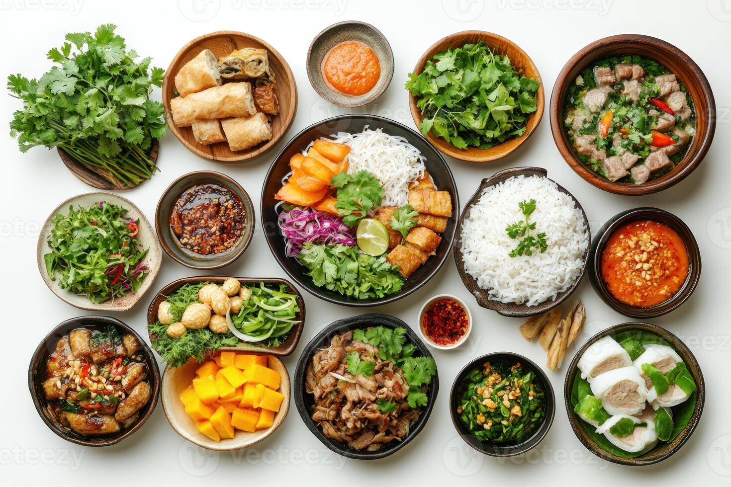 A Variety of Vietnamese Dishes Arranged on a White Surface photo