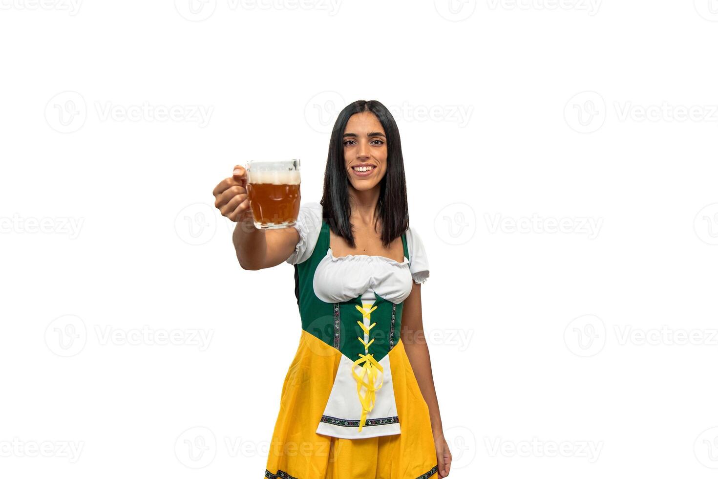 Bavarian girl in traditional clothing holding a beer glass for Oktoberfest white background photo
