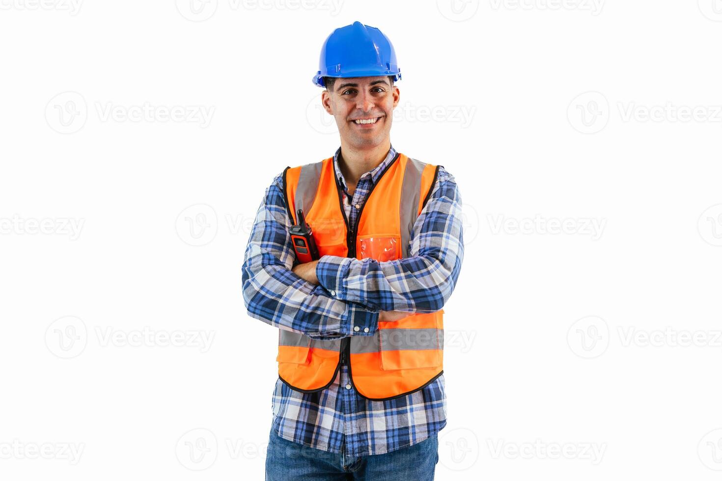 Engineer in blue helmet and orange reflective vest smiling with arms crossed white background photo