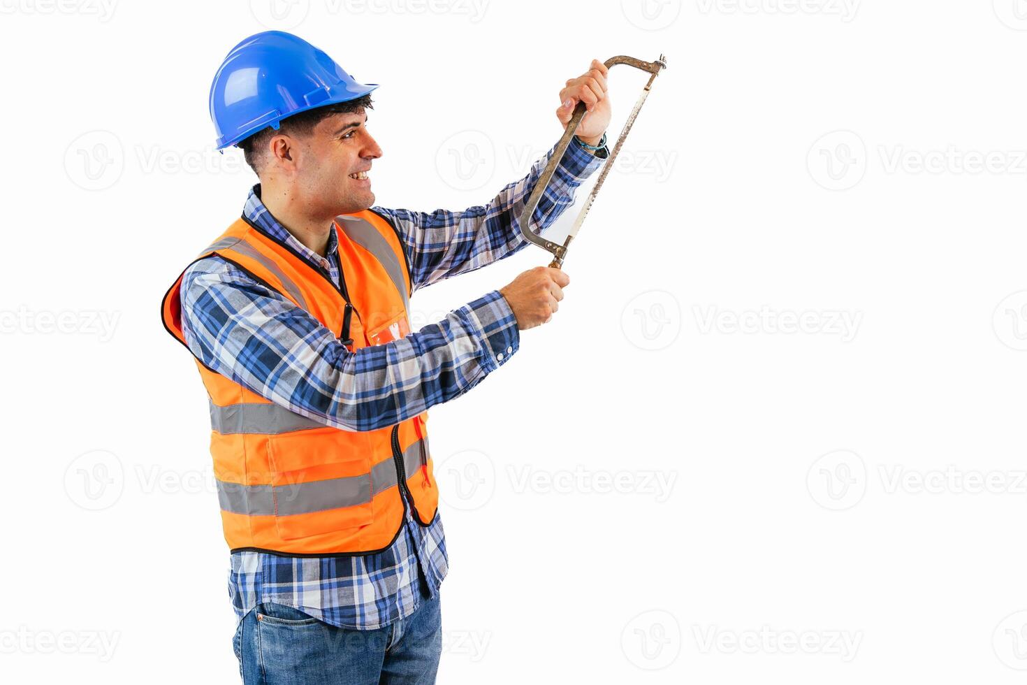 copyspace Construction worker cutting with a saw white background photo