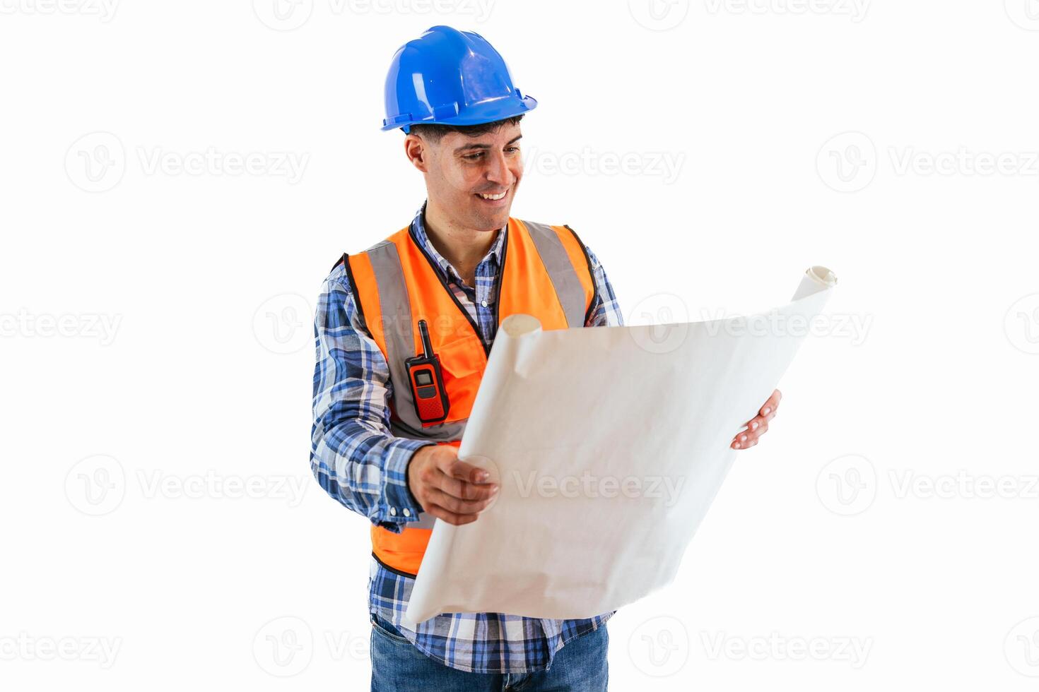 Smiling engineer holding construction plan wearing orange vest and safety helmet white background photo