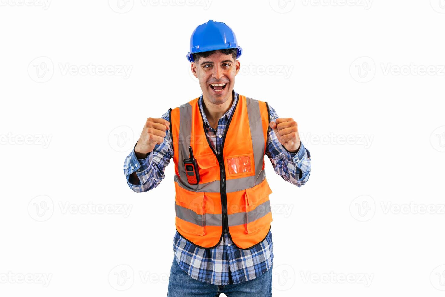 Happy engineer in reflective orange vest and safety helmet celebrating with fists white background photo