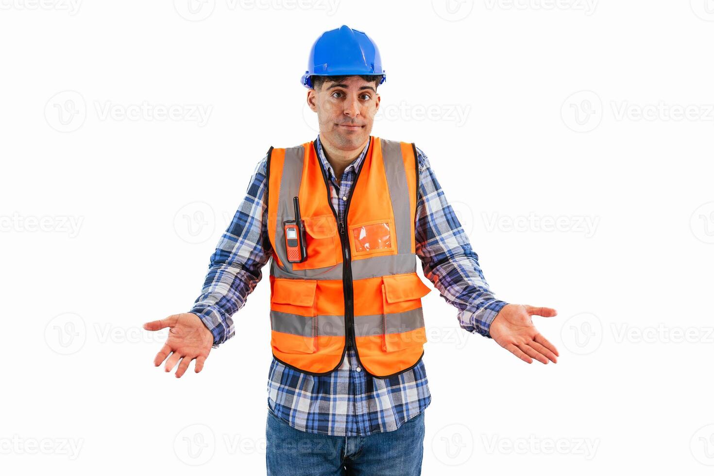 Resigned construction worker shrugging shoulders wearing safety helmet and orange vest photo