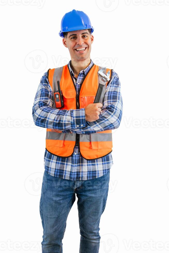 vertical Smiling construction worker holding a wrench wearing orange vest and safety helmet photo