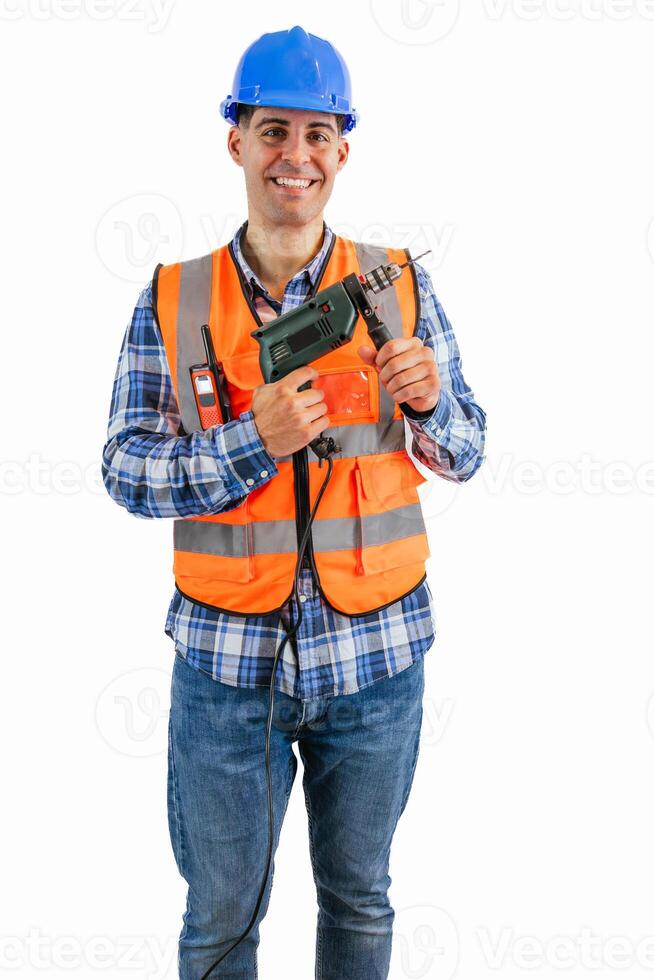 vertical Smiling construction worker holding a drill wearing orange vest and safety helmet photo
