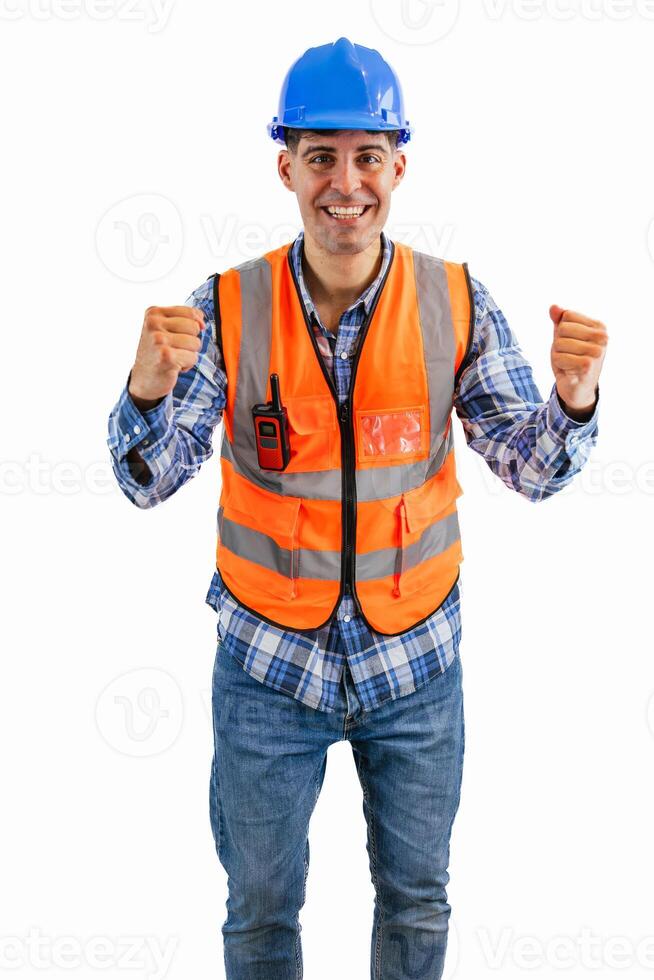 vertical Triumphant construction worker celebrating towards the camera with clenched fists photo