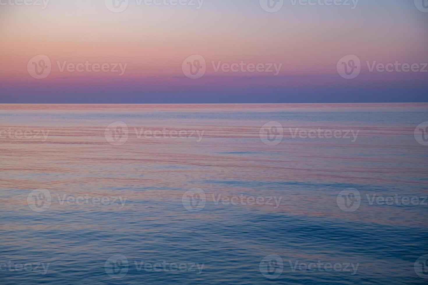 Beautiful gentle sunset on the sea, natural background, calm, serenity and peace of mind photo