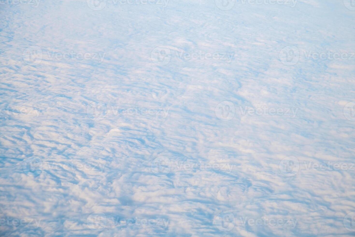 Top view of clouds, view from airplane, natural white background photo