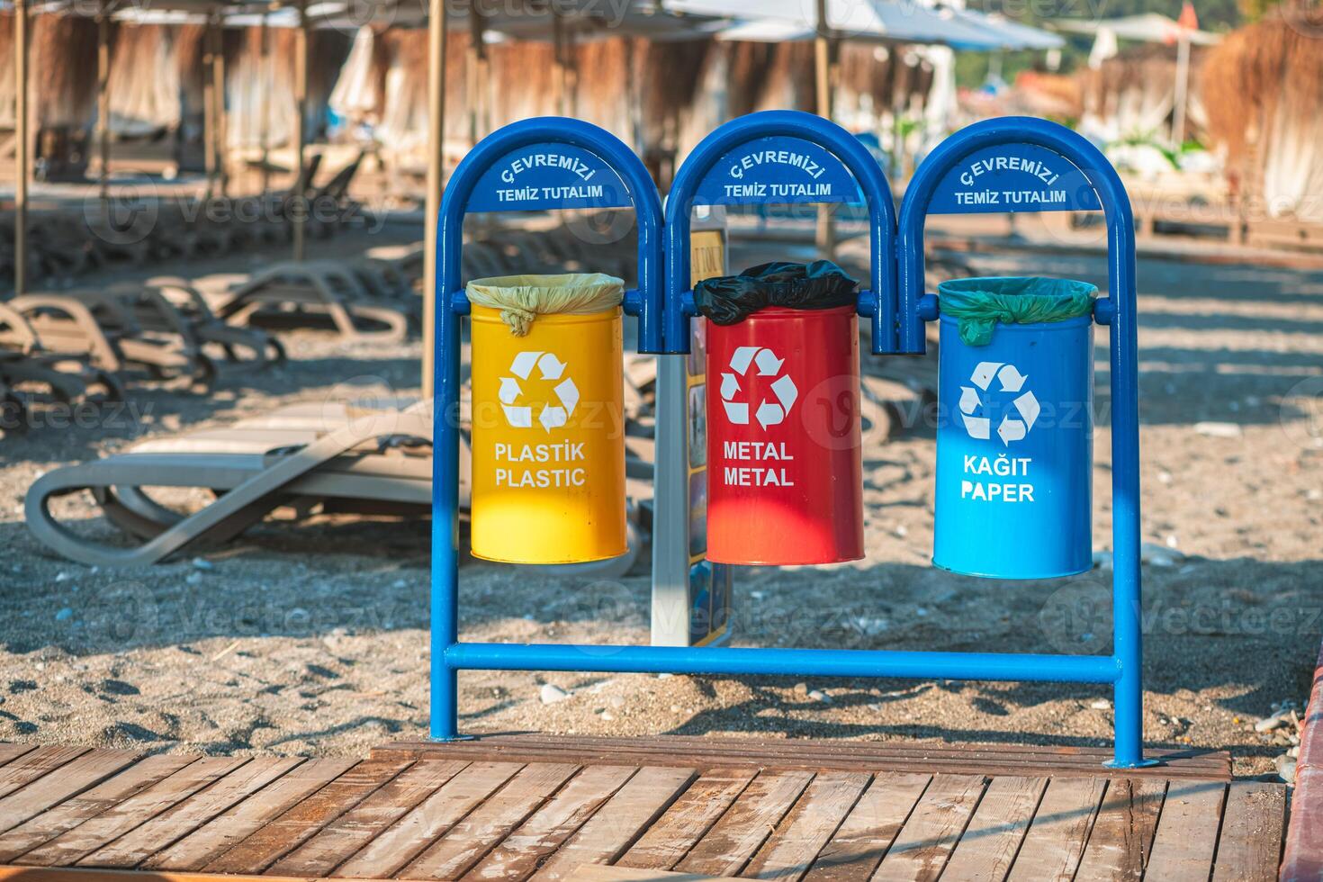 containers, trash bins for separate waste on the beach, waste recycling, environmental protection photo