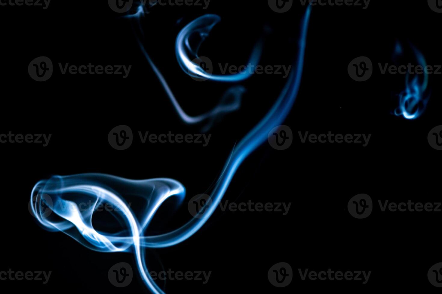 blue smoke, vapor, fog cloud on black background for using in composition and overlay photo
