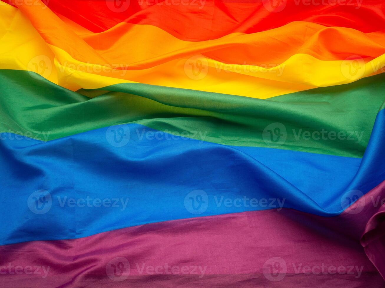 Top view of the rainbow flag or LGBT flag. Full frame photo