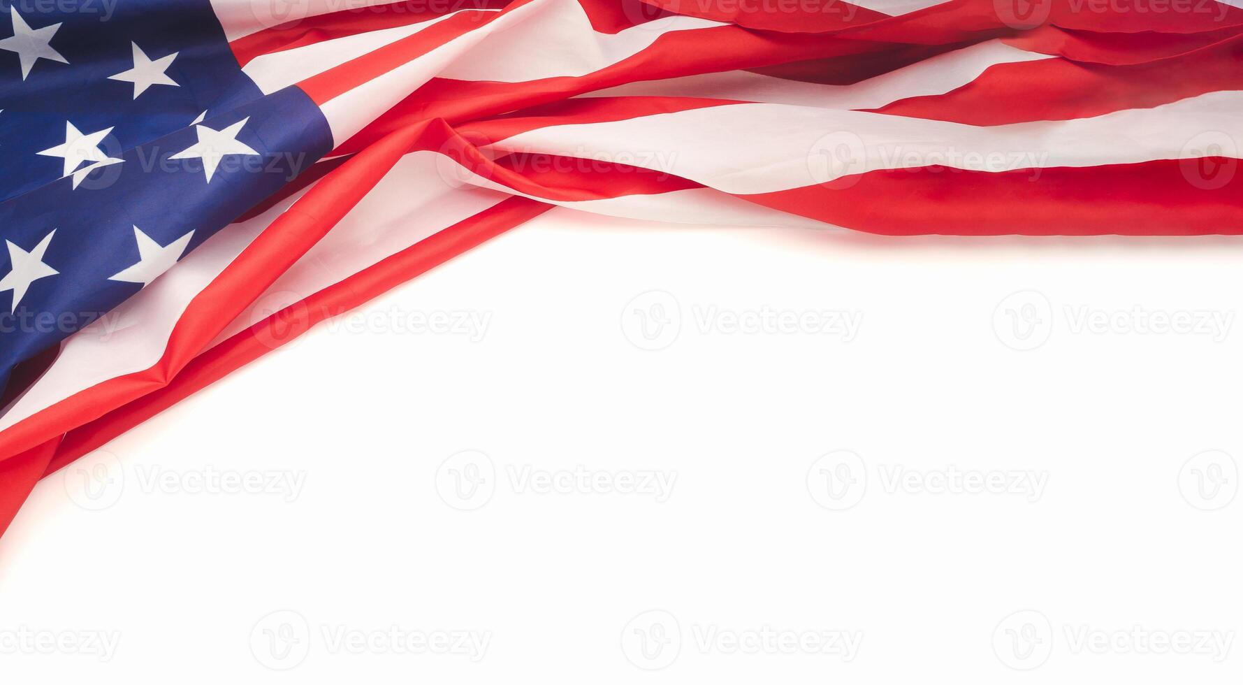 Top view of the American flag on a white background with copy space for text photo
