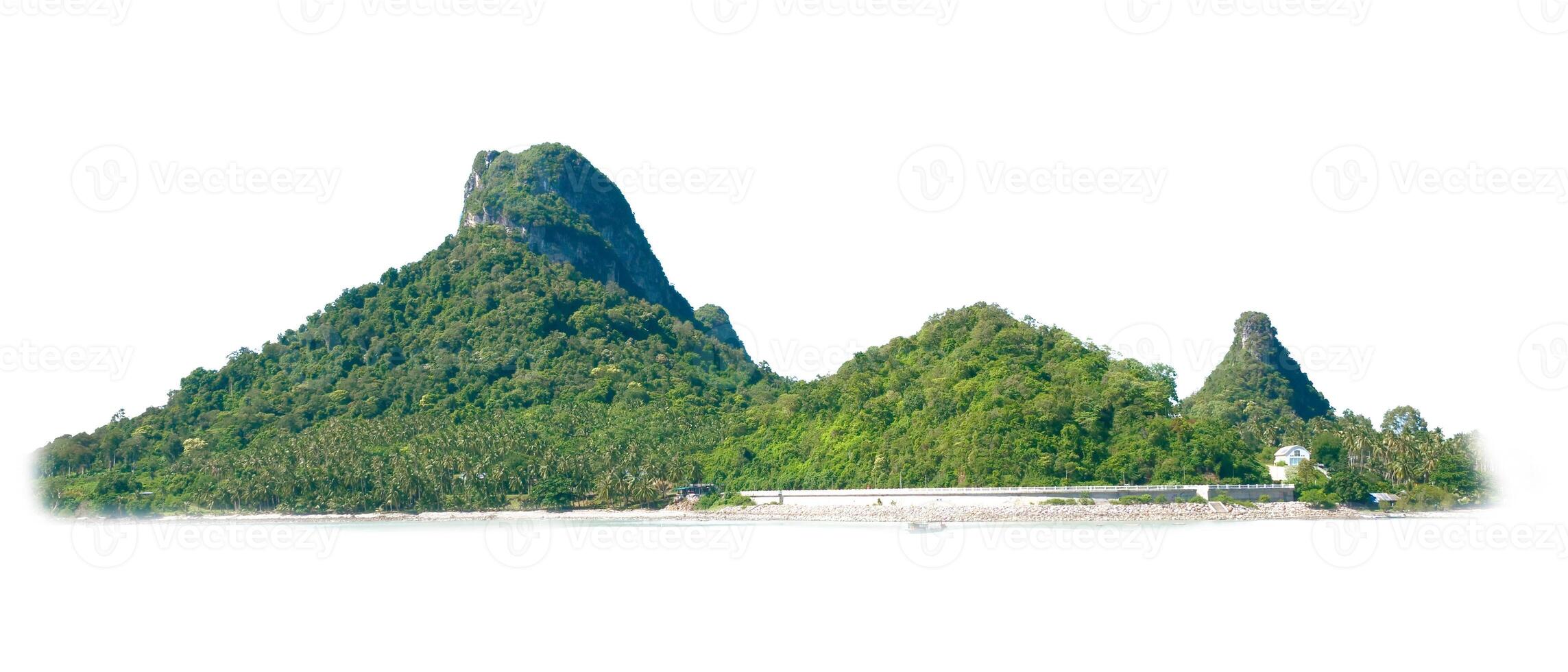 Stunning Tropical Mountain Landscape with Lush Greenery and Clear Blue Sky in a Serene Coastal Setting photo