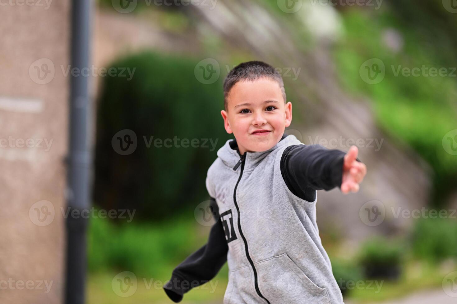 Children playing together in a park or engaging in a game. photo