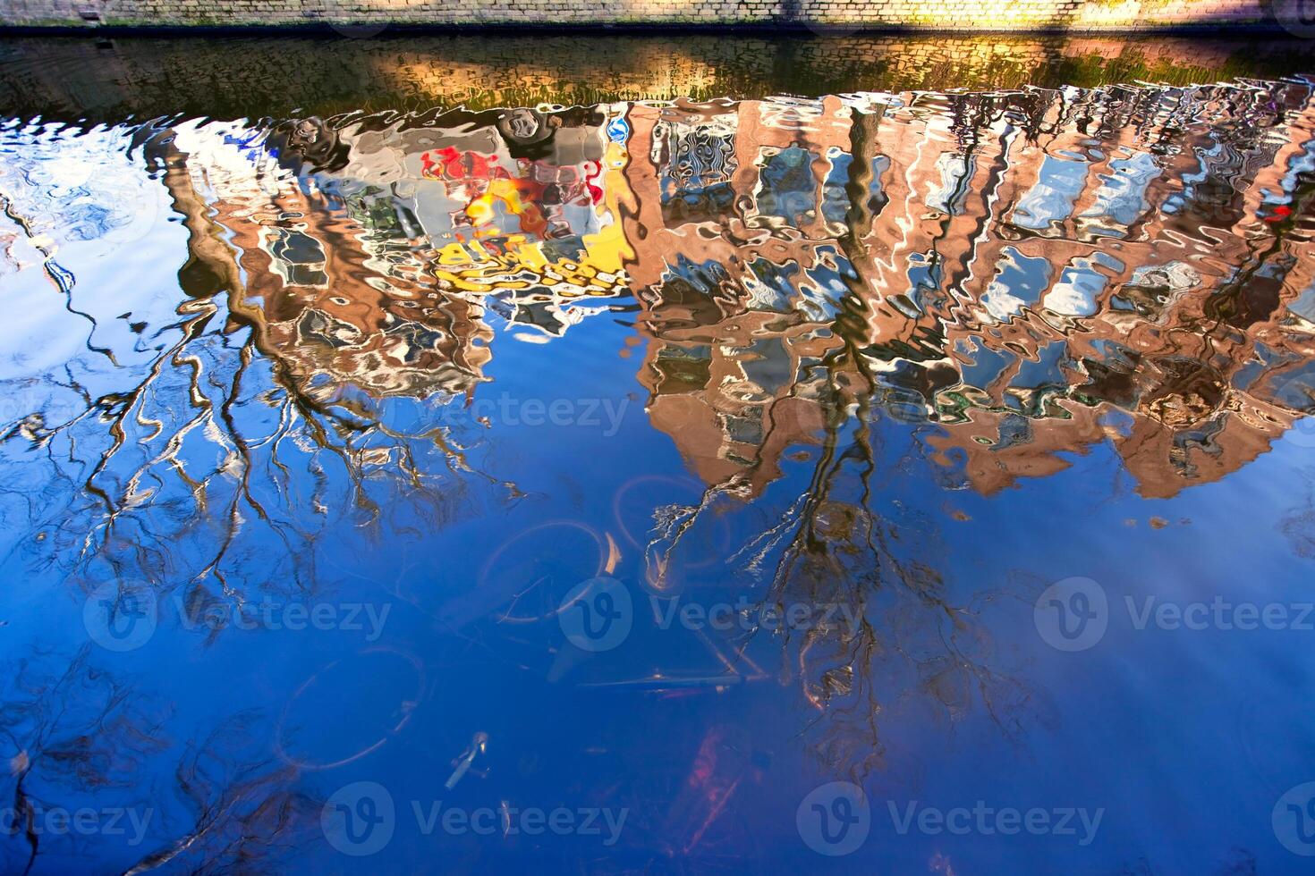 House reflection in the canal of Delft photo