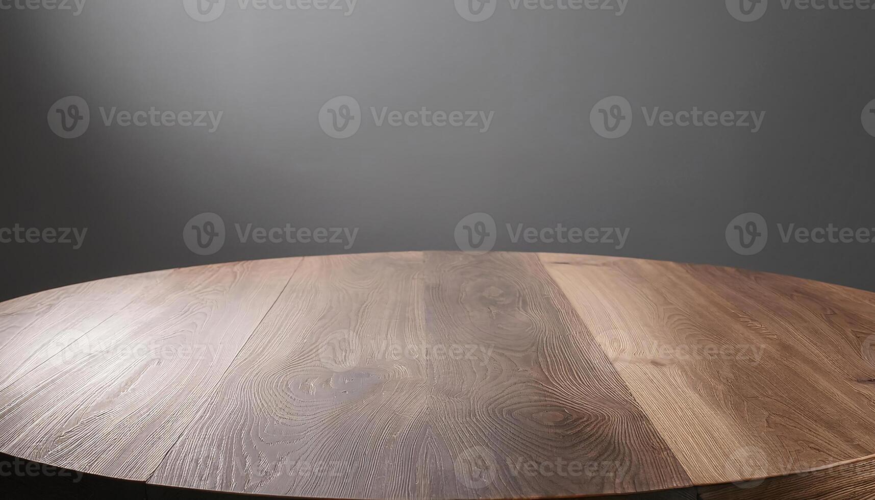 circular wooden table with natural grain pattern and neutral gray background for product display or dining setup photo