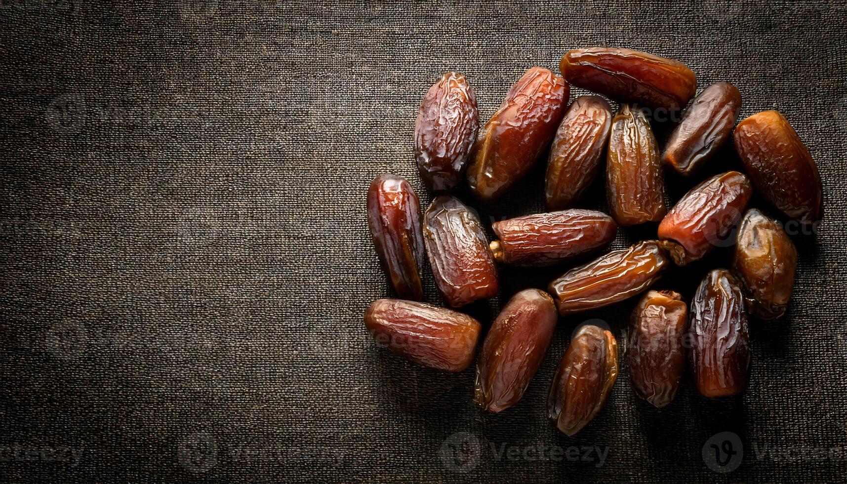 organic dried dates on rustic fabric background showcasing natural sweetness and healthy fruit snack for vegan and nutritious diets photo