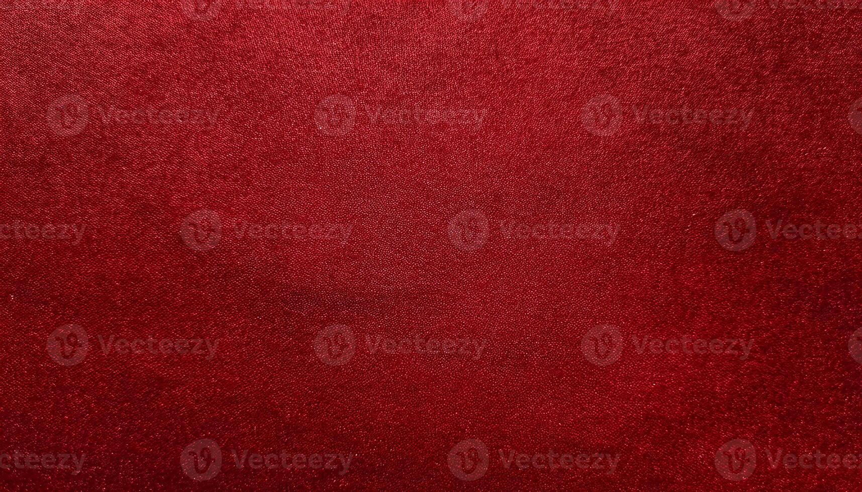 close-up of luxurious red velvet-finished paper with soft tactile texture and deep color photo