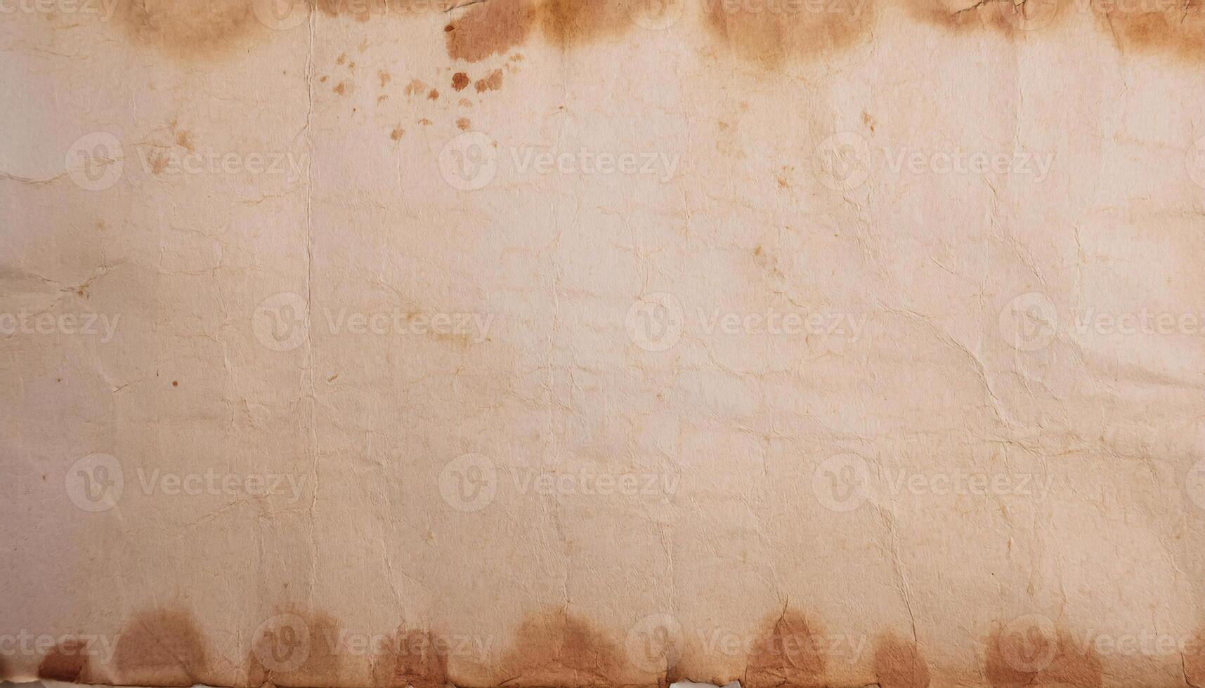 close-up of distressed parchment paper with brown stains, aged texture, and visible creases for vintage and antique design projects photo