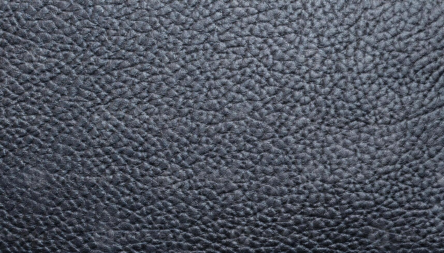 close-up of pebble-textured leather in dark gray with detailed grain and matte finish for versatile applications photo