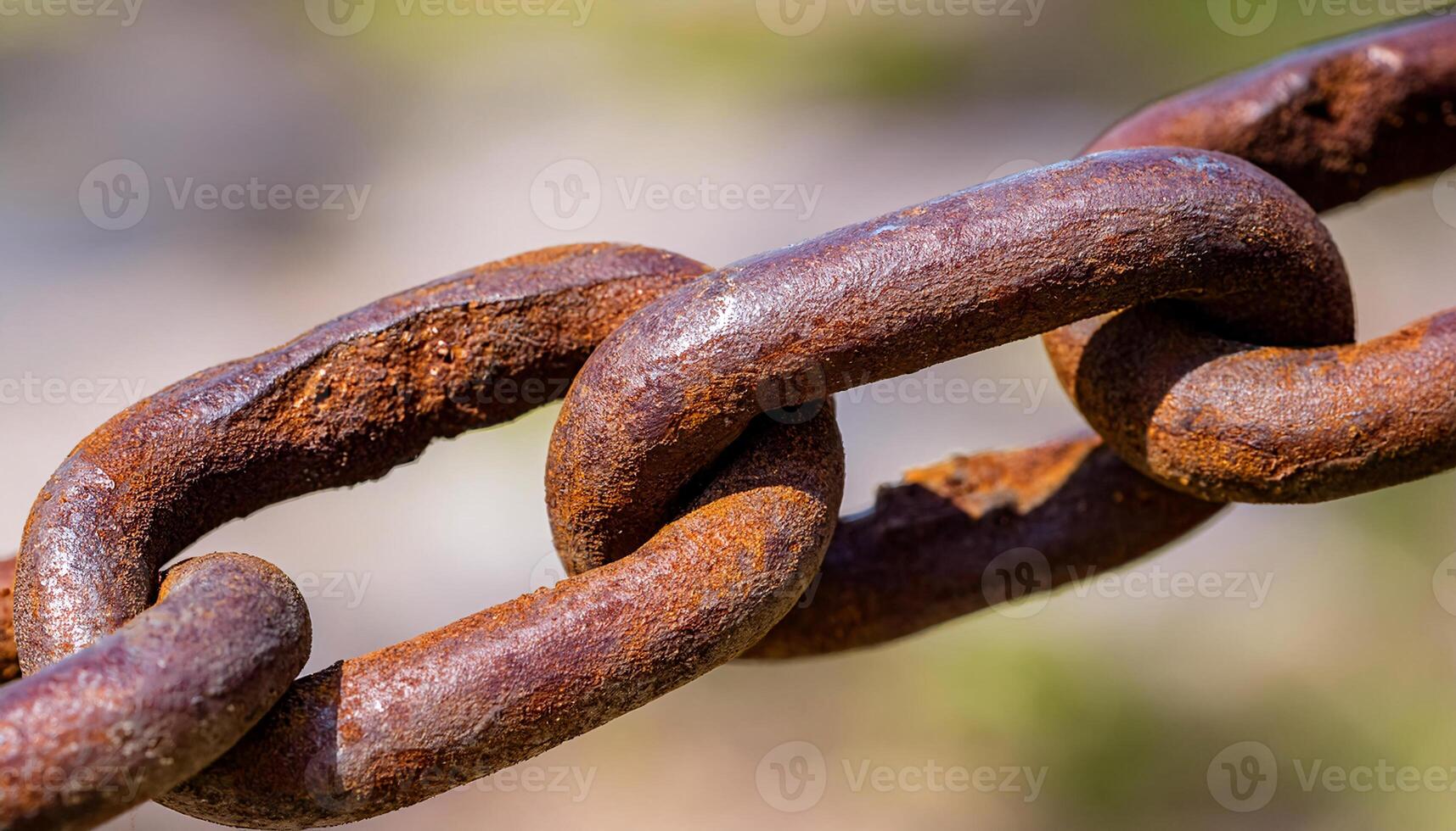 close-up of rusted chain links with detailed corrosion texture and weathered metal surface for industrial and abstract backgrounds photo