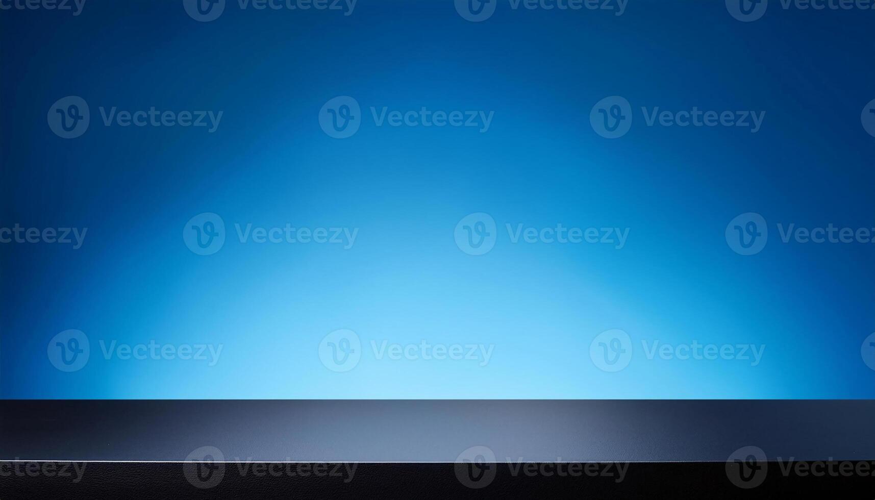 minimalist black table with sleek matte surface against a vibrant gradient blue background, perfect for modern tech product displays and professional presentations photo