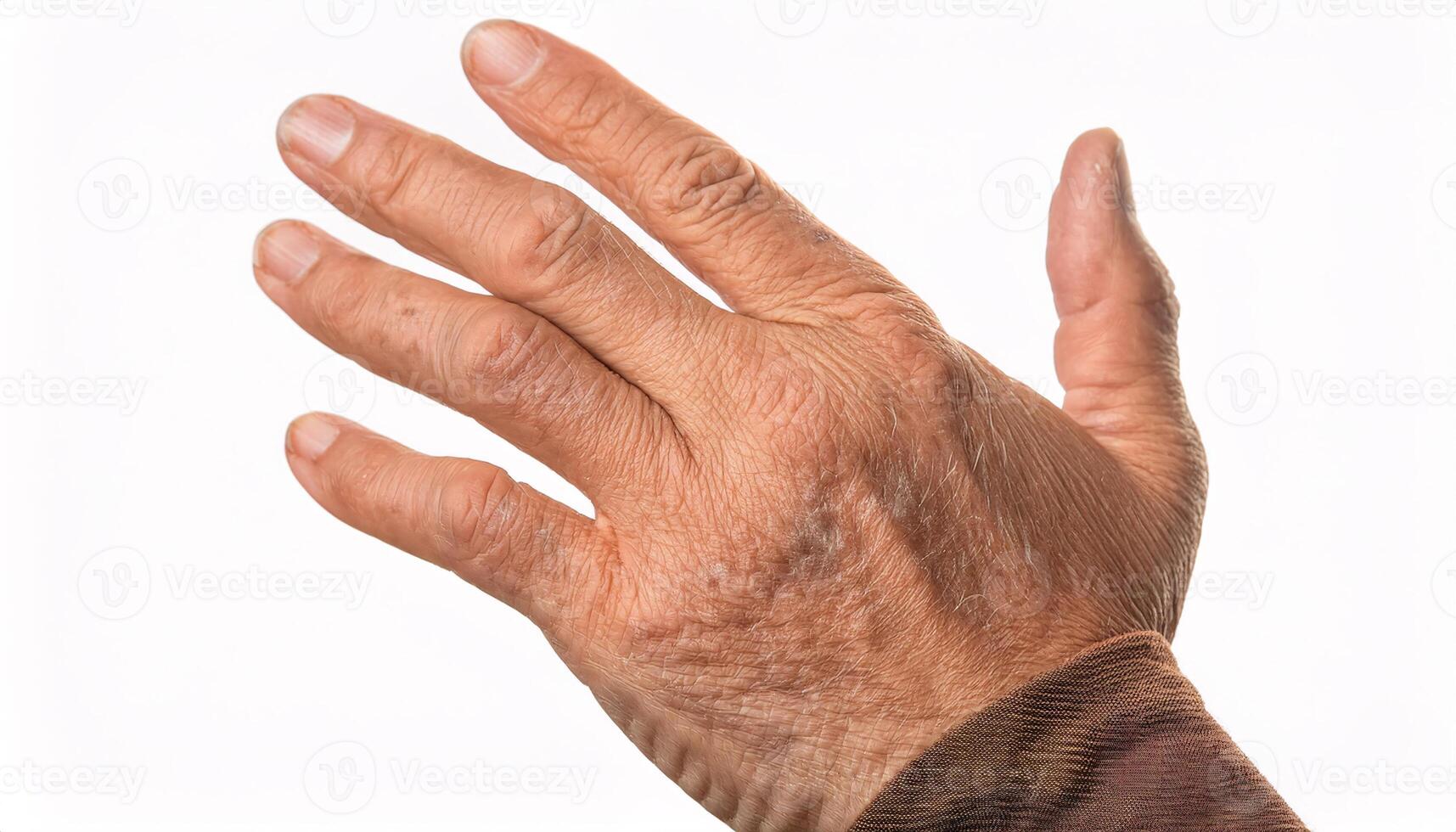 macro view of an elderly hand with visible age spots and wrinkles, showcasing natural skin texture isolated on white background photo