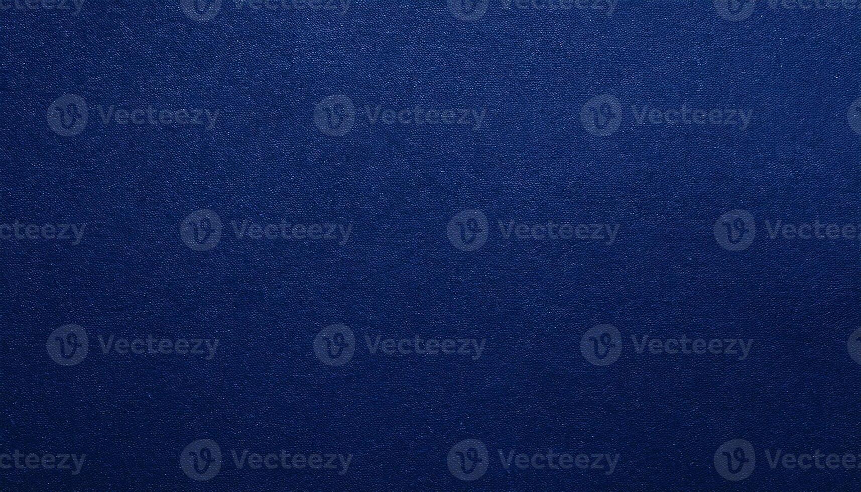 close-up of dark navy-blue textured paper with a smooth matte finish for premium backgrounds and graphic designs photo