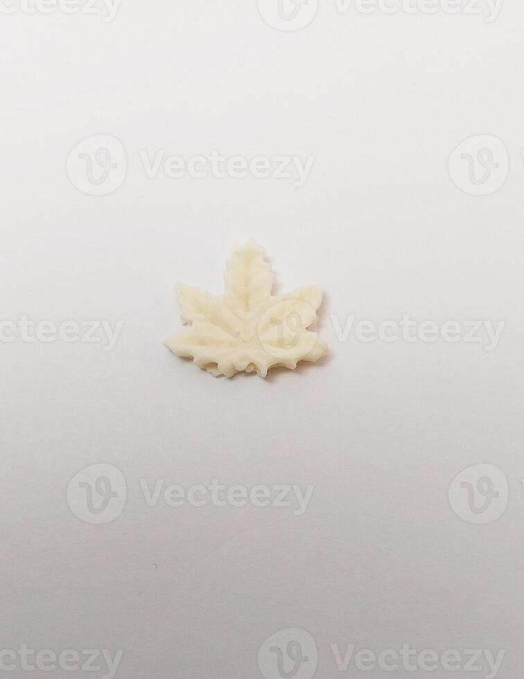 white leaf miniature cute handmade clay isolated sculpture photo