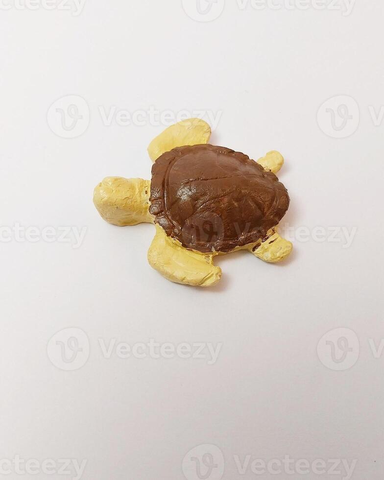 miniature cute handmade clay isolated sculpture nature turtle animal brown photo