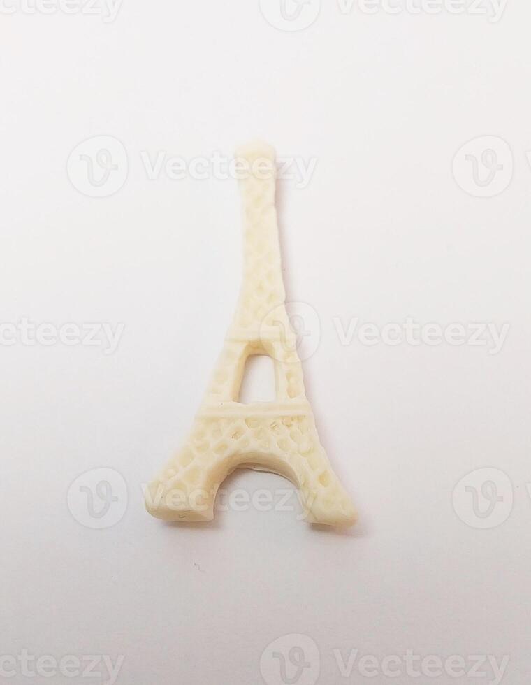 miniature cute handmade clay isolated sculpture white eifle france travel sightseeing photo
