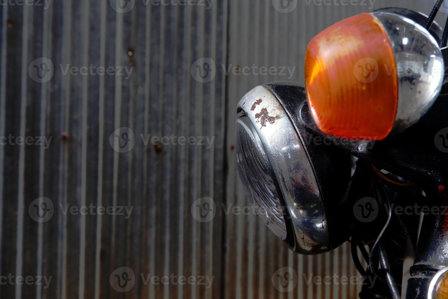 Vintage red motorcycle engine with chrome and metal details, featuring retro electric equipment and glass components, isolated with a toy-like appearance photo