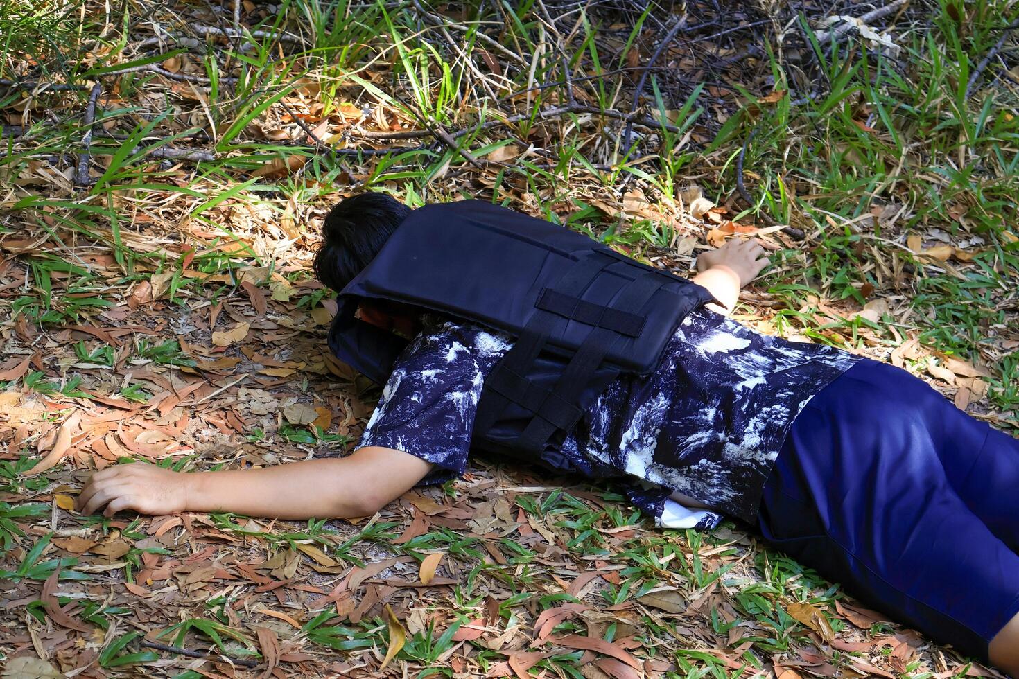 Tourists wearing life jackets fainted or died in the forest while hiking. photo