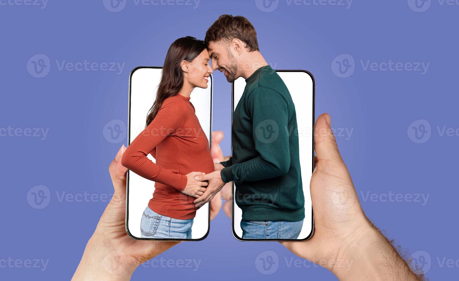 This joyful couple shares a tender moment as they embrace through their smartphones, symbolizing love and connection. They are anticipating a baby, highlighting affection in their everyday life. photo